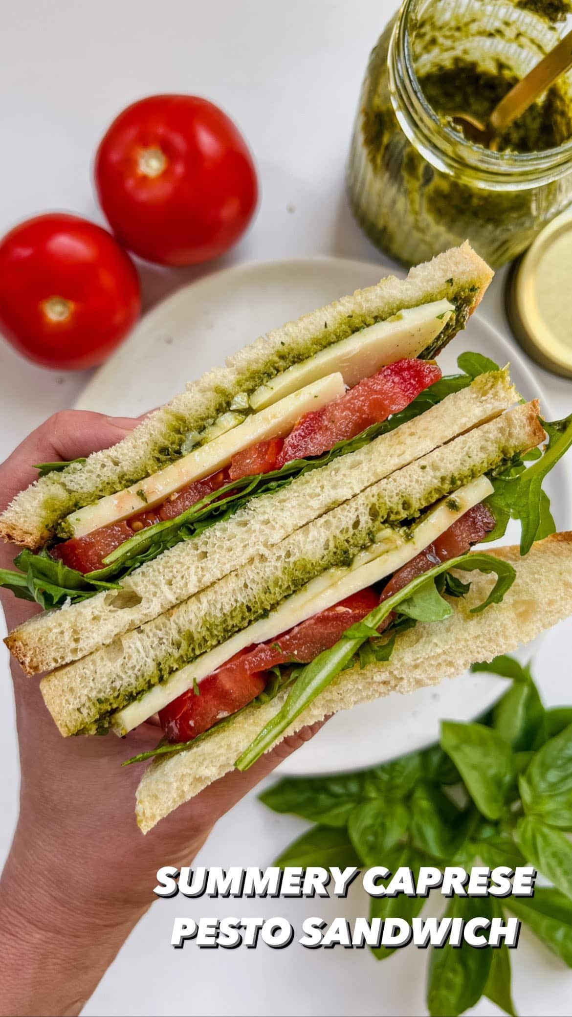 SUMMERY CAPRESE PESTO SANDWICH🍅 i’ll use any vessel for my favorite pesto!🌿
.
what you need to make it:
-sourdough
-pesto (recipe below)
-mozzarella
-tomato
-basil
-arugula
-olive oil
-sea salt & pepper
.
for the pesto:
-2-2 1/2 cups packed basil
-1/2 cup grated parmesan
-1/2 cup olive oil
-1/3 cup pine nuts
-1 tsp garlic, chopped
-1/4 tsp sea salt 
-sprinkle of black pepper
.
pour it all in the food processor or blender & blend it up! when it’s done, test it out and see if you want more of anything👌🏻 i make a big batch & freeze some in individual portions so they’ll be easy to pull out later!🪴
.
enjoying all the flavors of summer when i can!☀️ what’s your favorite way to use pesto?!